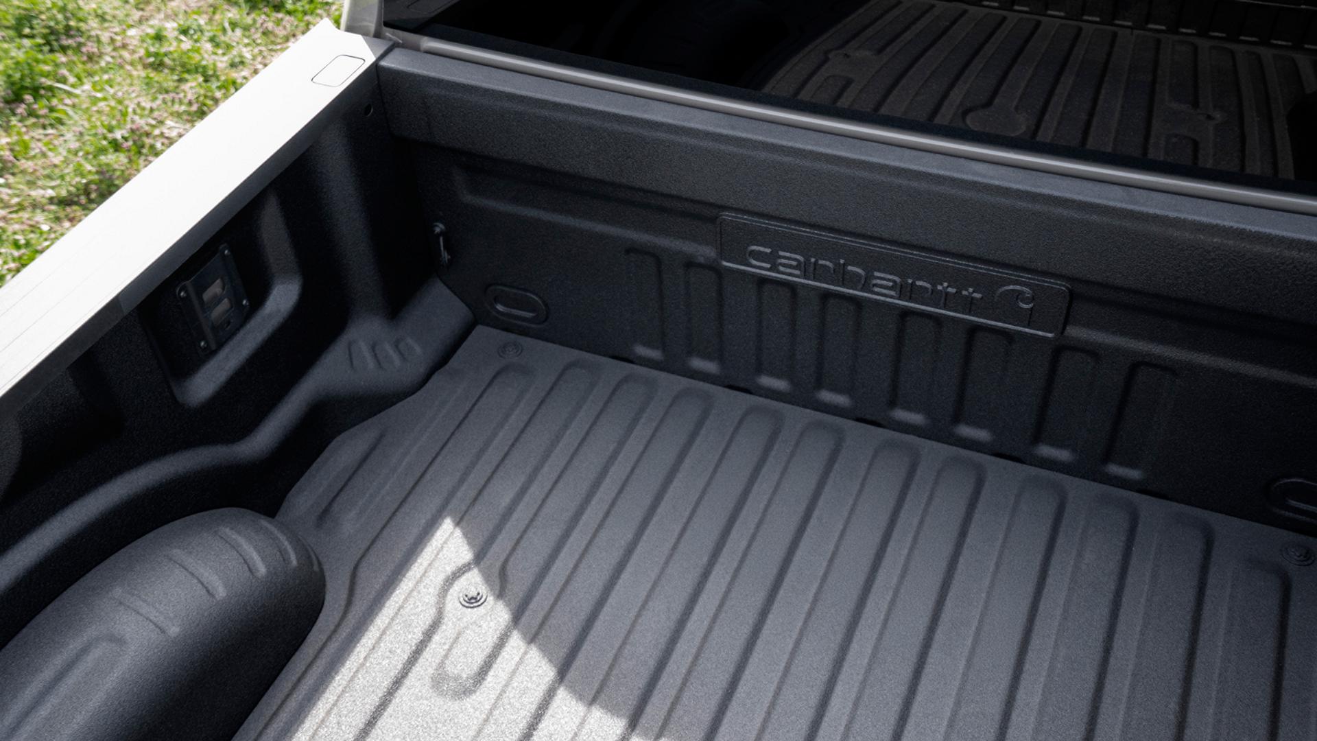 Inside view of the truck bed on the 2027 Ford Super Duty® F-350® XLT model with the Super Duty Carhartt® Package