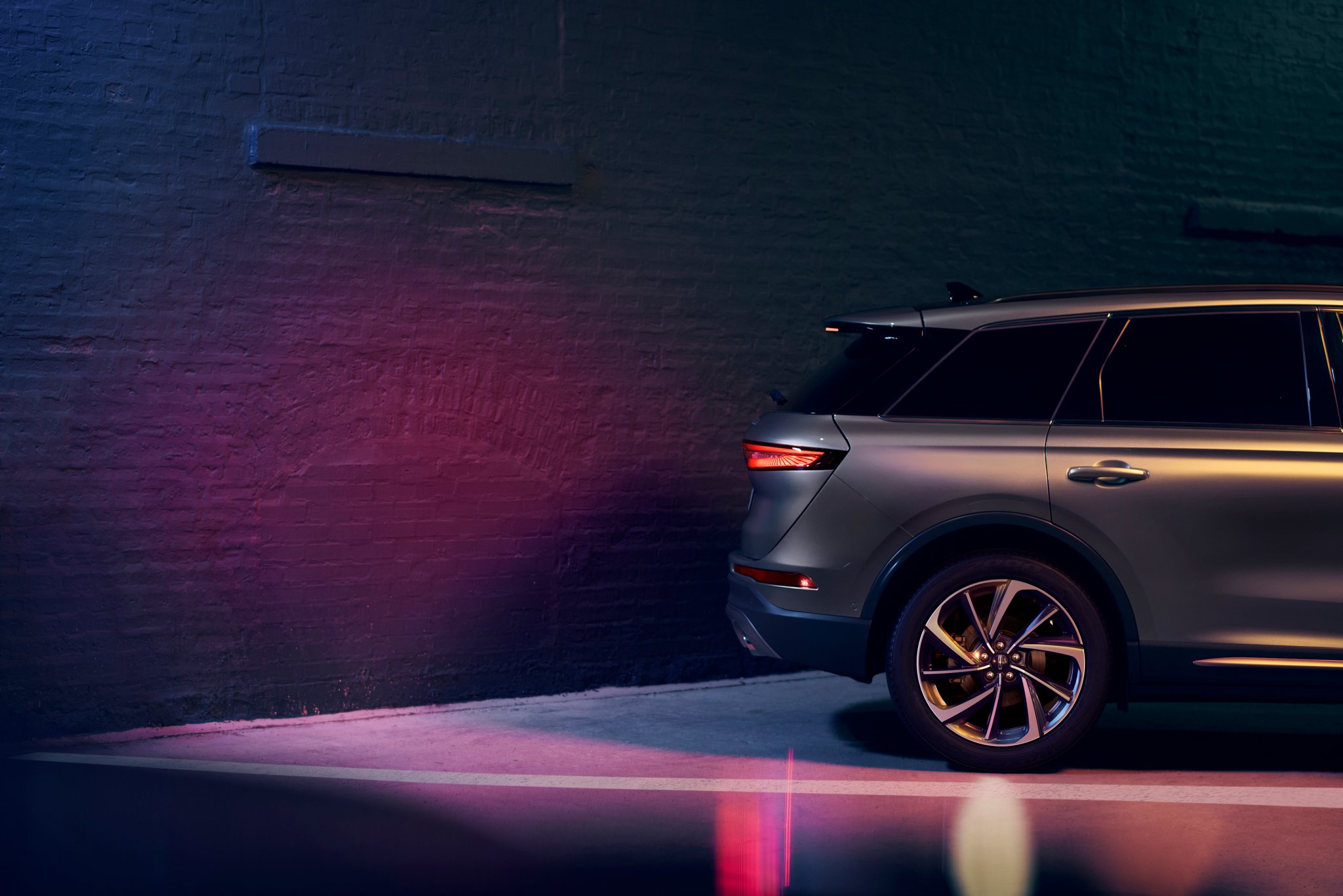 A 2026 Lincoln Corsair® SUV uses Reverse Brake Assist as it backs up towards a wall