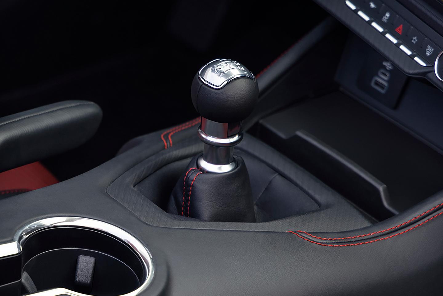 2026 Ford Mustang® GT 6-speed manual transmission shifter with available Carmine Red interior