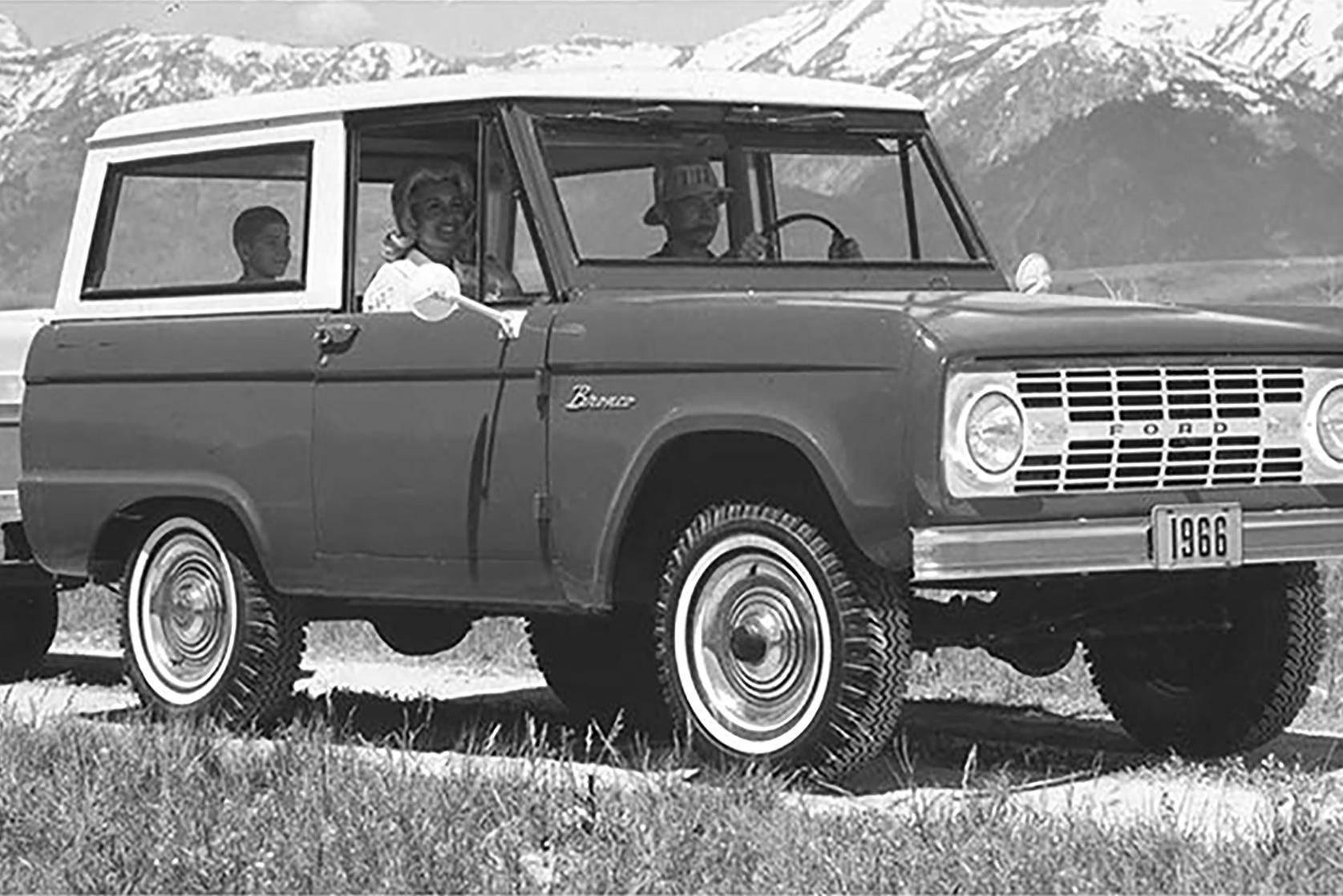 Image of 1966 Ford Bronco with trailer