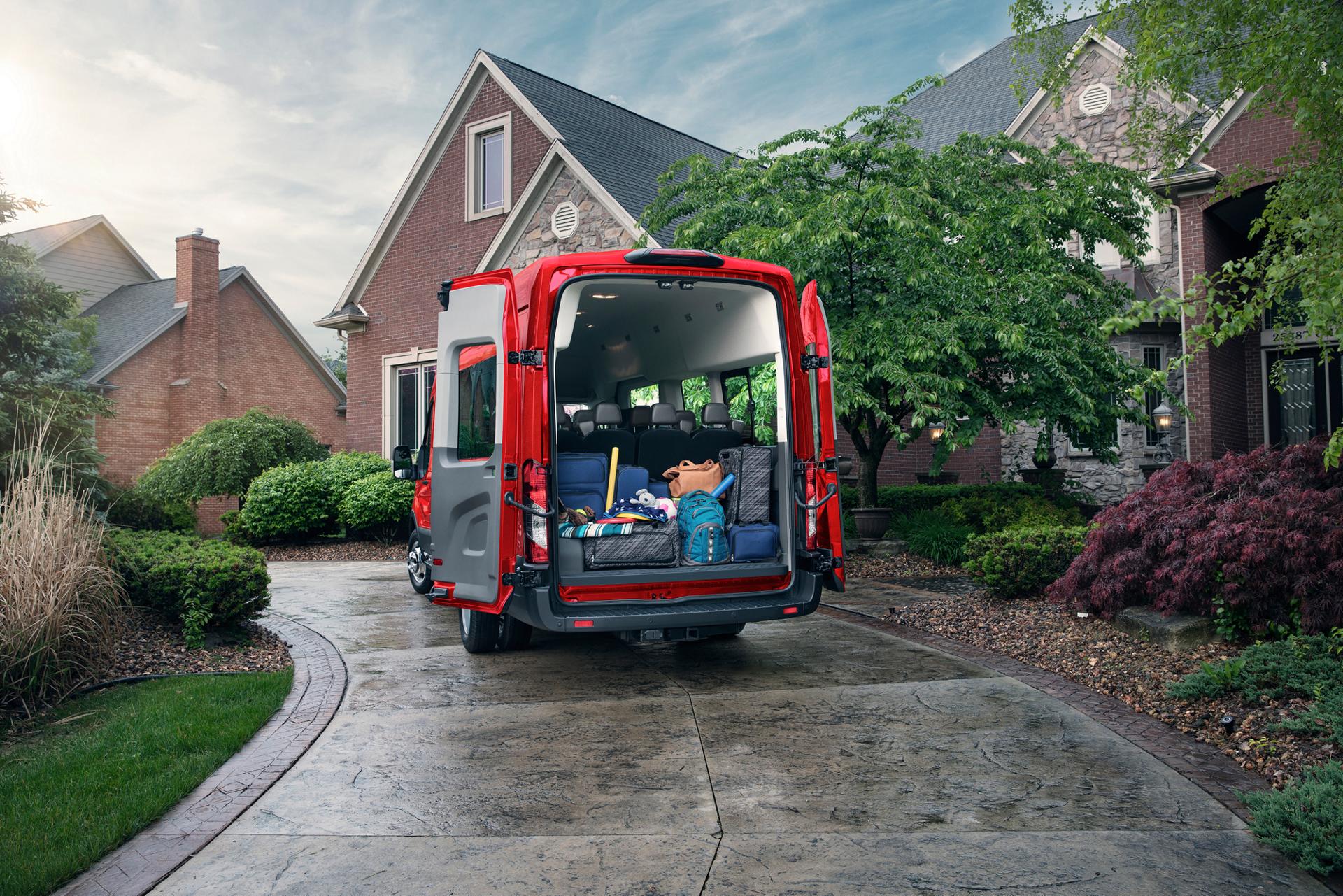 A 2026 Ford Transit® van rear view with supplies loaded in the van