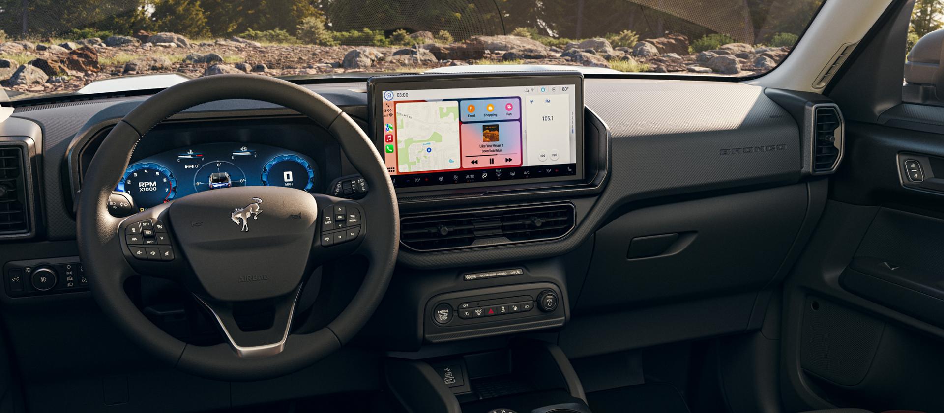 2025 Ford Bronco Sport® interior showing steering wheel, center touchscreen, and instrument panels