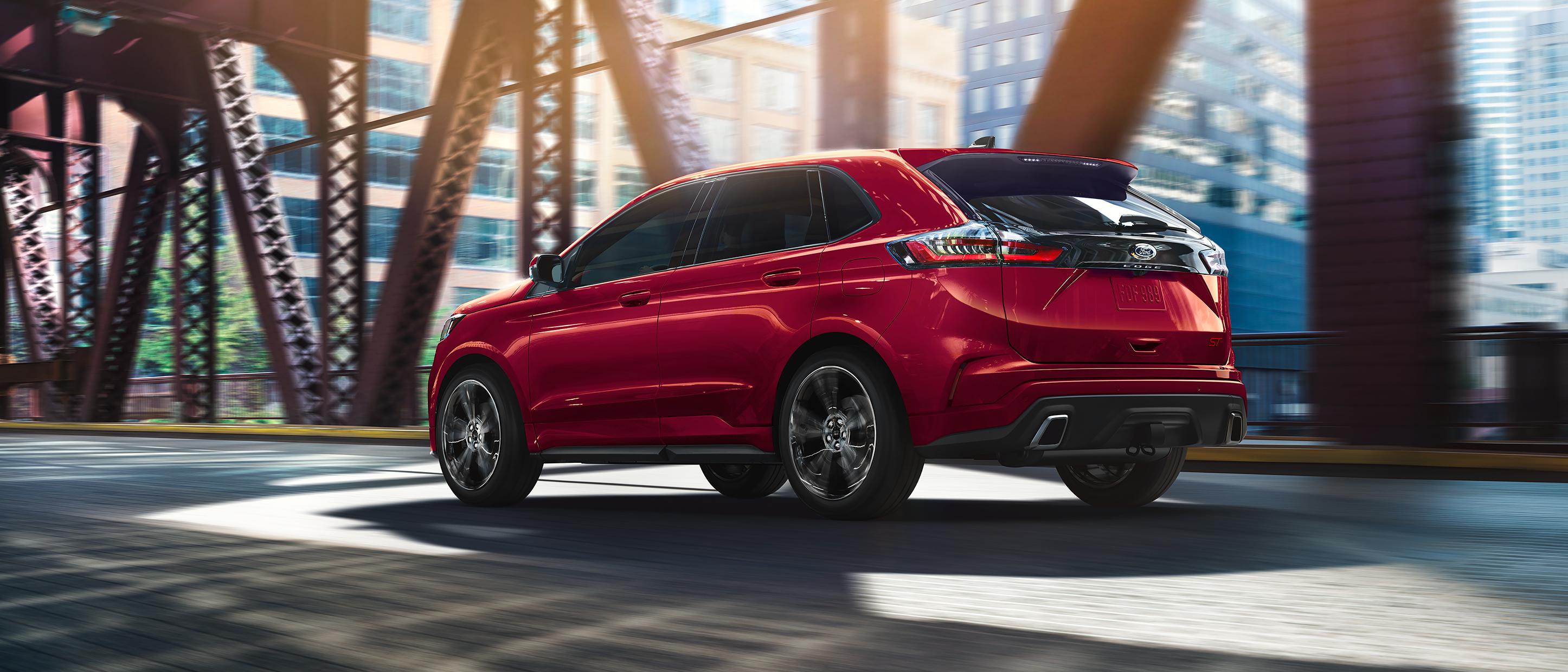 2024 Ford Edge® ST SUV being driven across a bridge