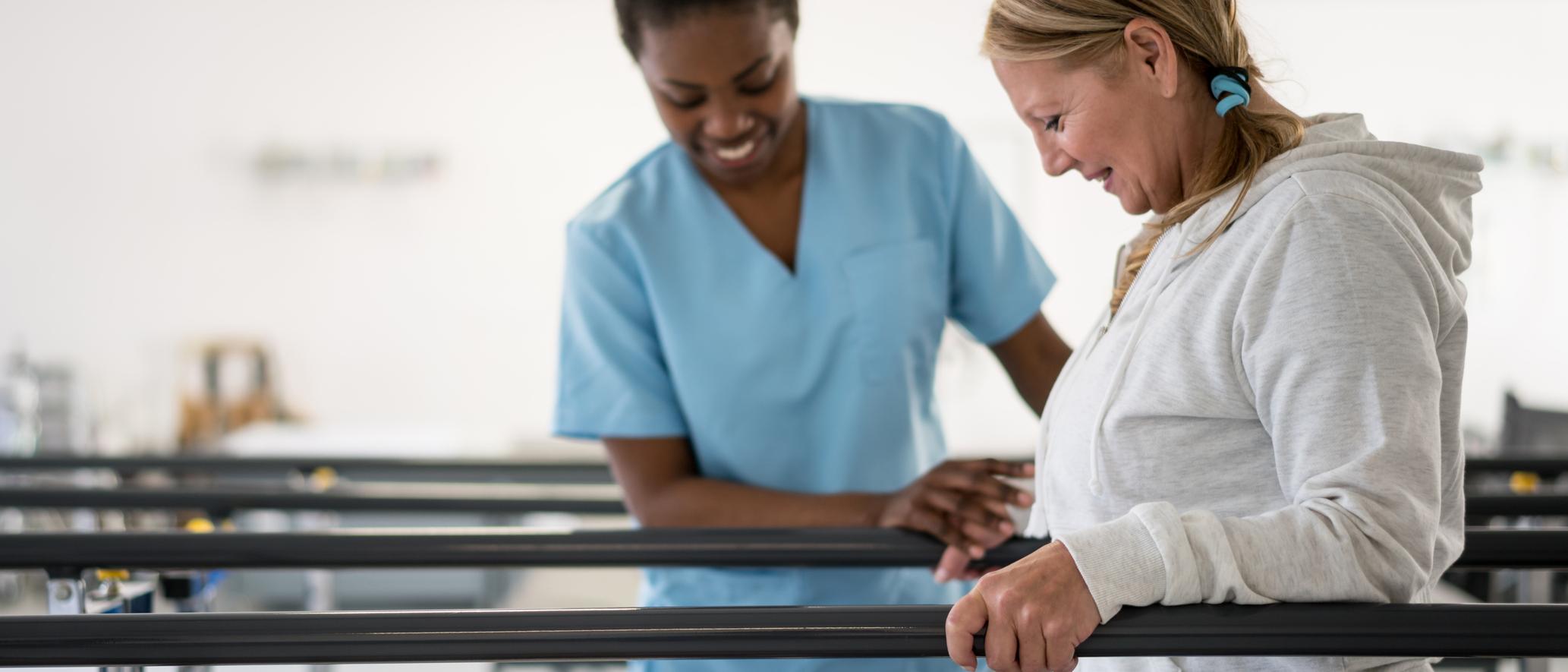 Nurse helping woman