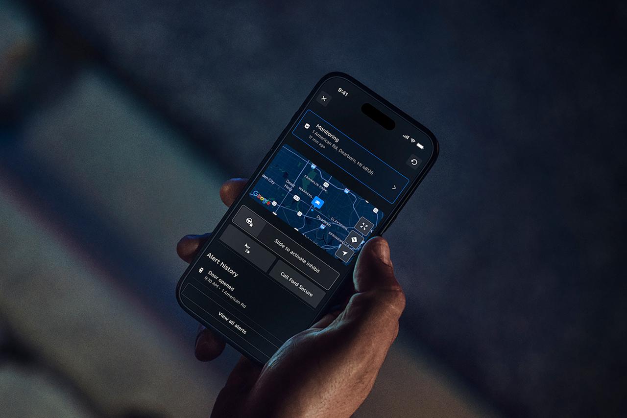 Person getting Ford Security Package alerts on a mobile phone