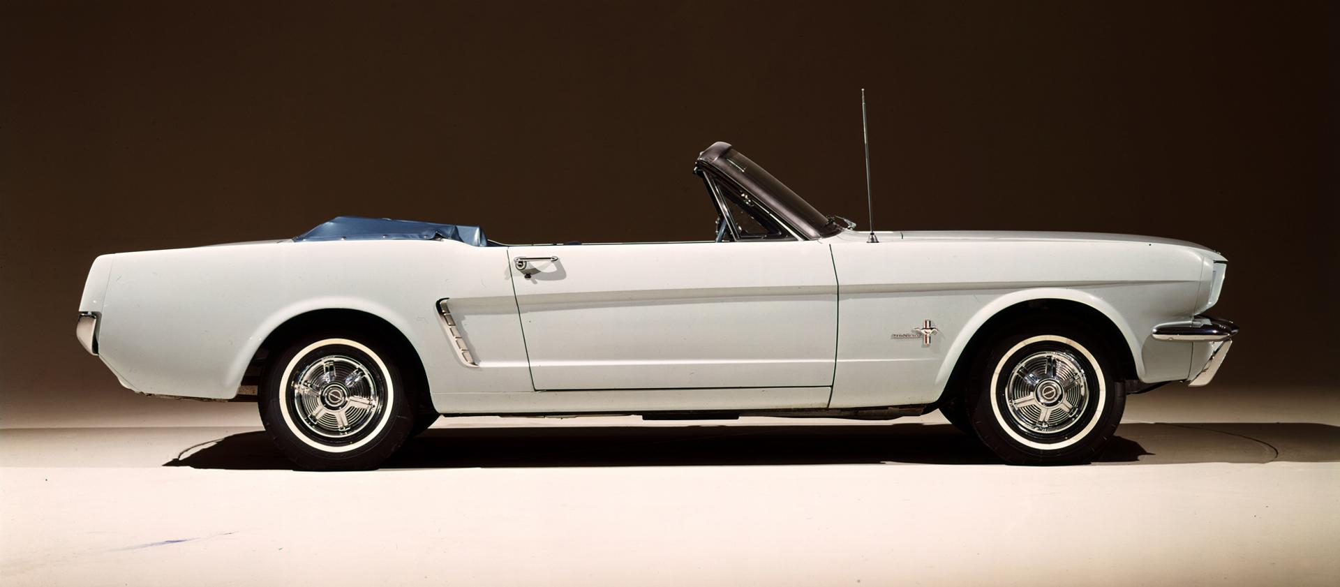 A 1965 Ford Mustang® convertible in a studio setting