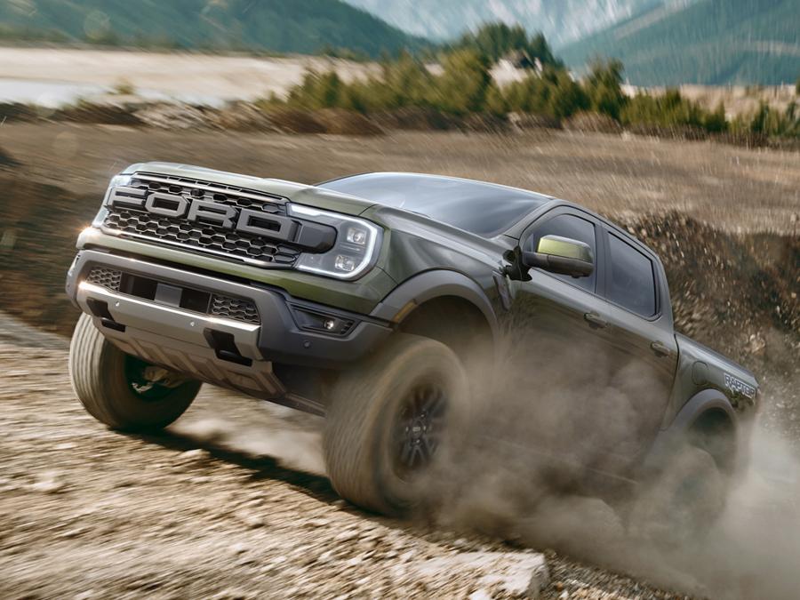 2026 Ranger® Raptor® being driven over rough terrain at high speeds in a mountainous desert