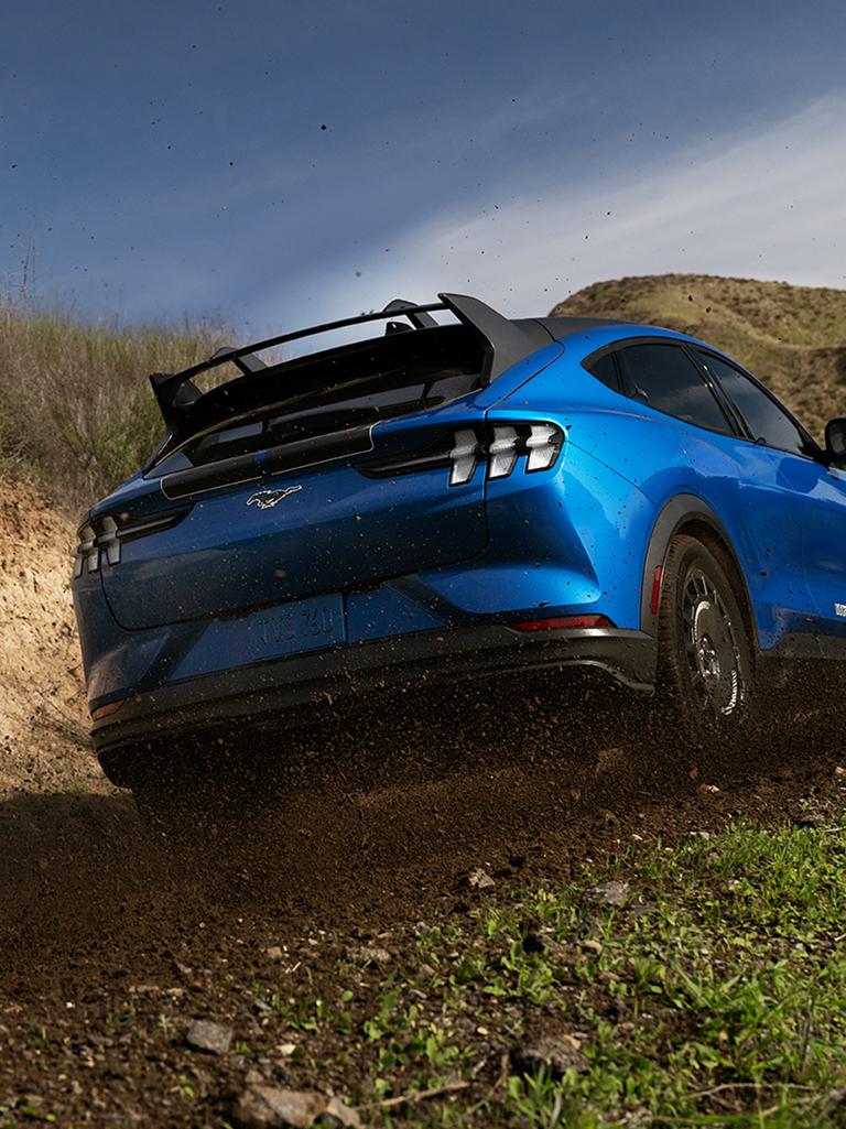 2026 Ford Mustang Mach-E® Rally model being driven off pavement