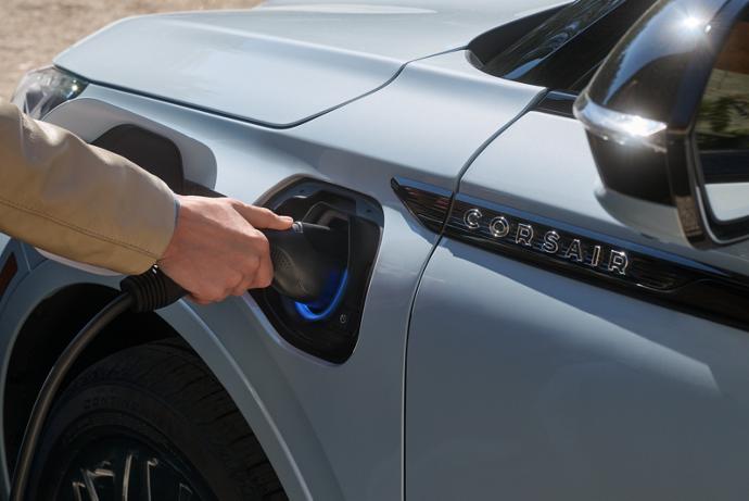 A person charging their 2025 Lincoln Corsair Grand Touring