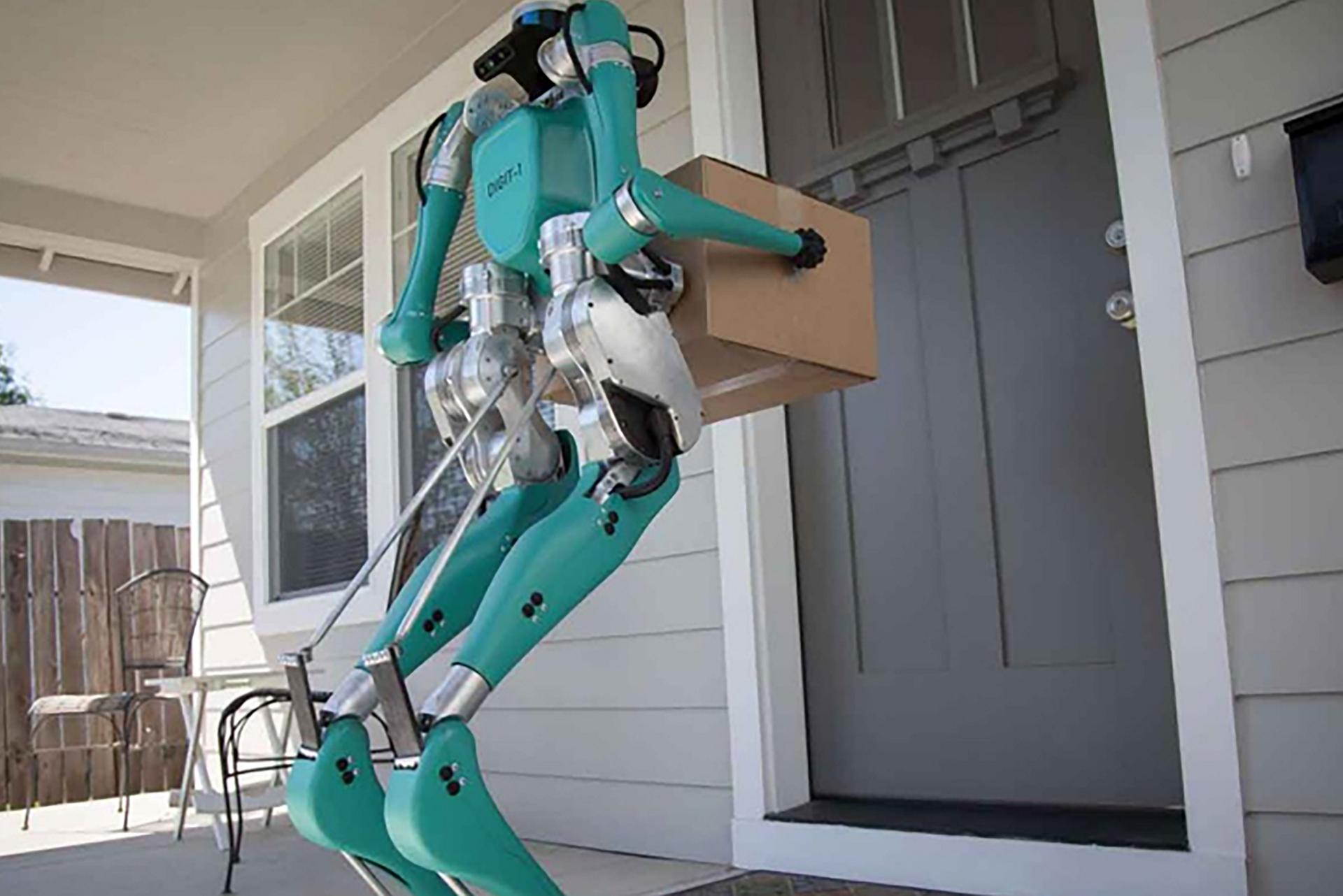 A robot delivers a package to the front door of a home