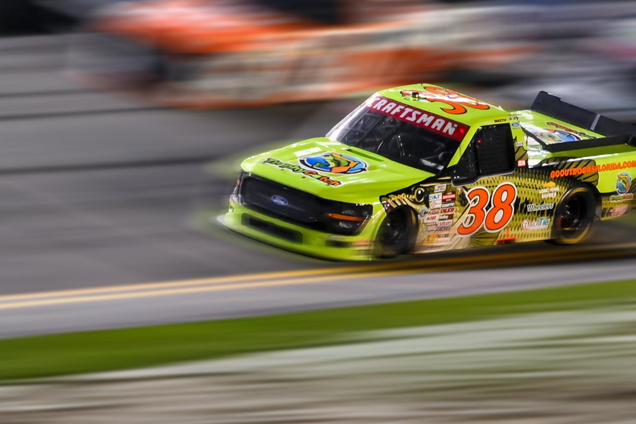 A 2026 Ford F-150® truck racing on a track
