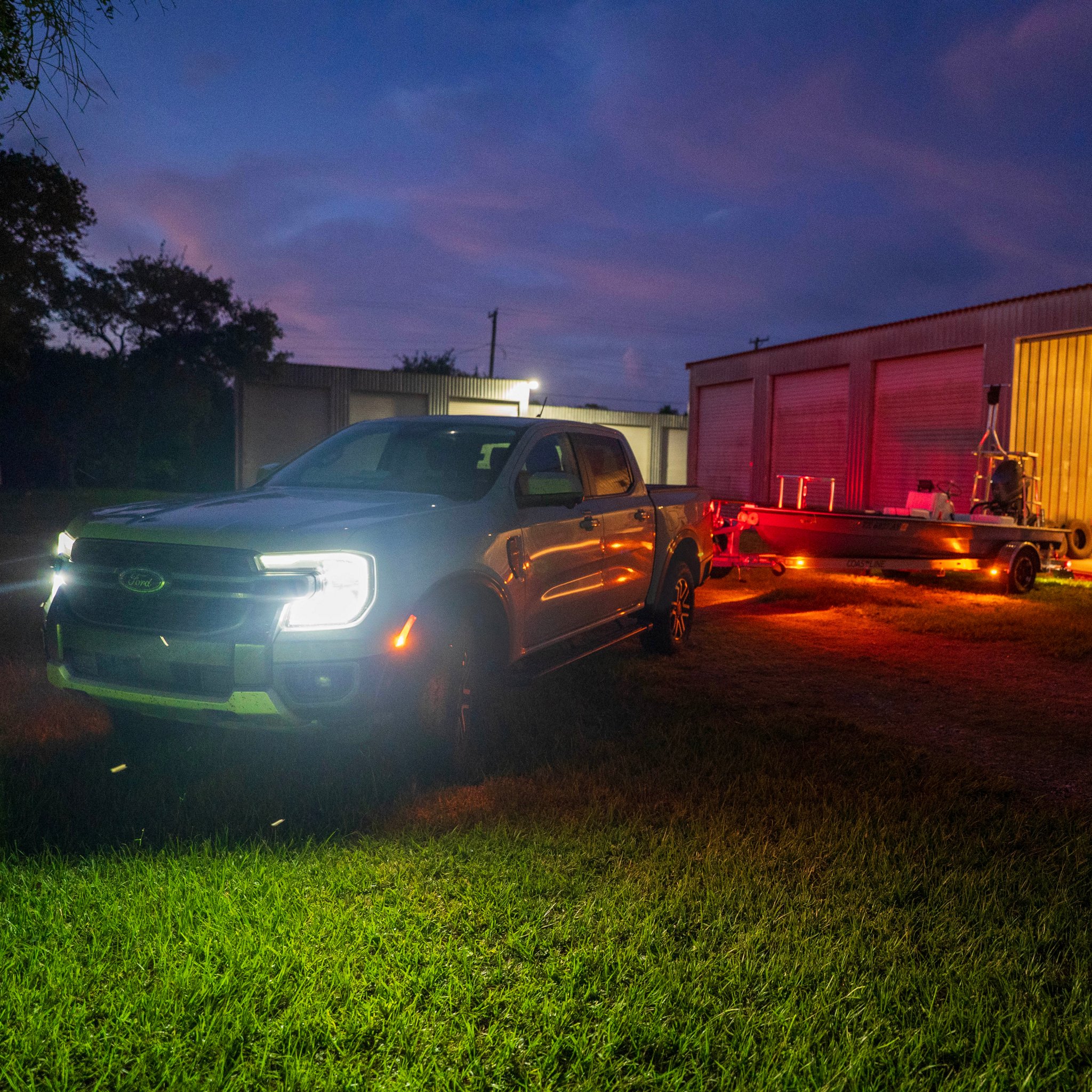 2026 Ford Ranger® Lariat® model with a trailer using the Trailer Light Check feature in the dark