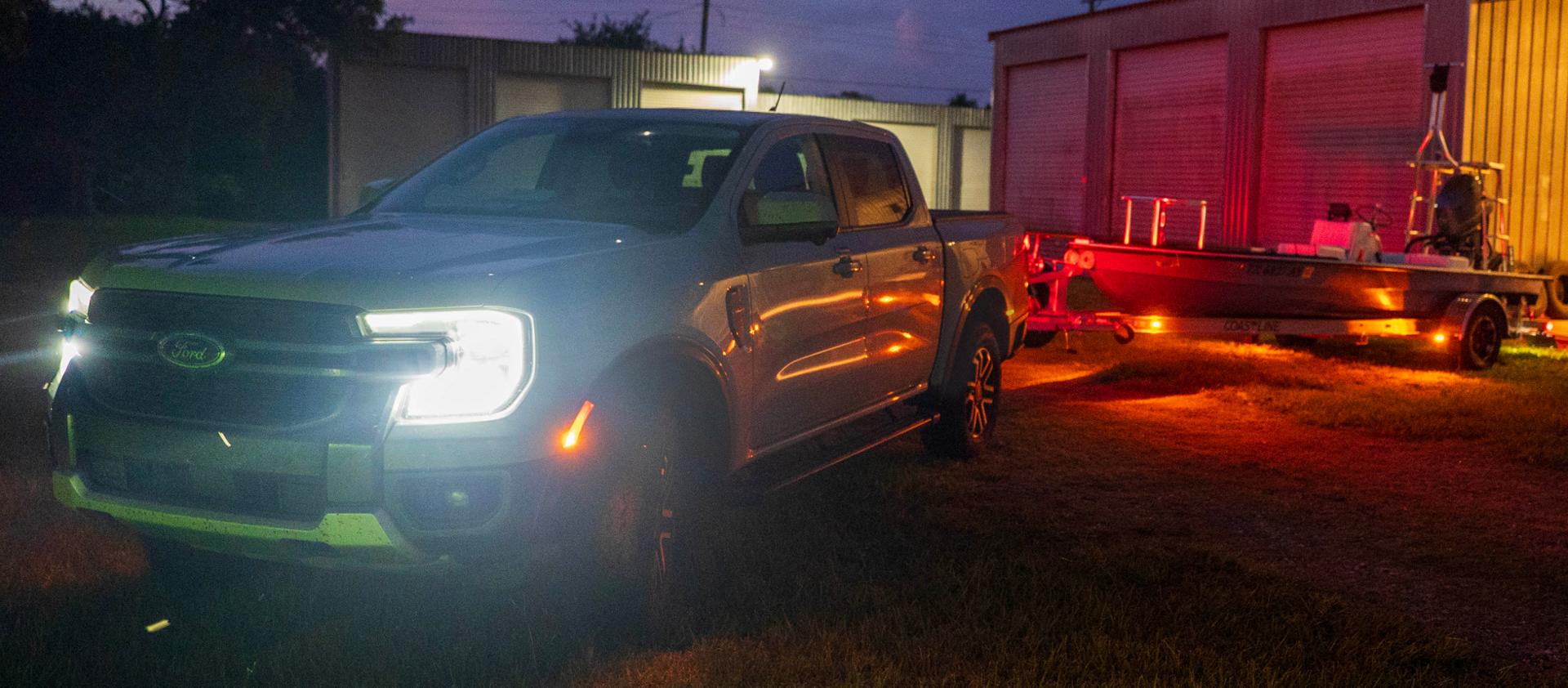2026 Ford Ranger® Lariat® model with a trailer using the Trailer Light Check feature in the dark