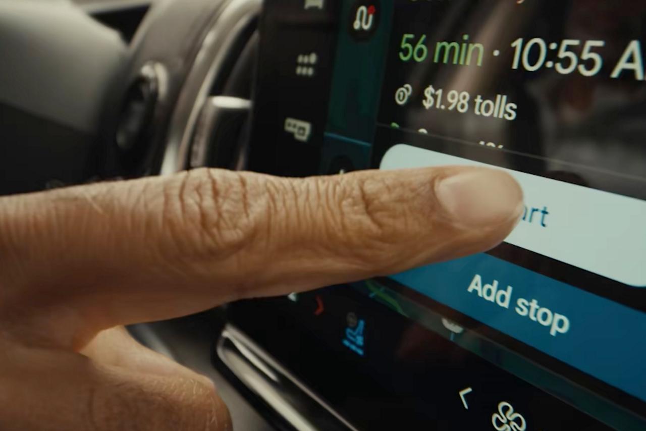 Person using available Ford Digital Experience features in a 2027 Ford Expedition® SUV