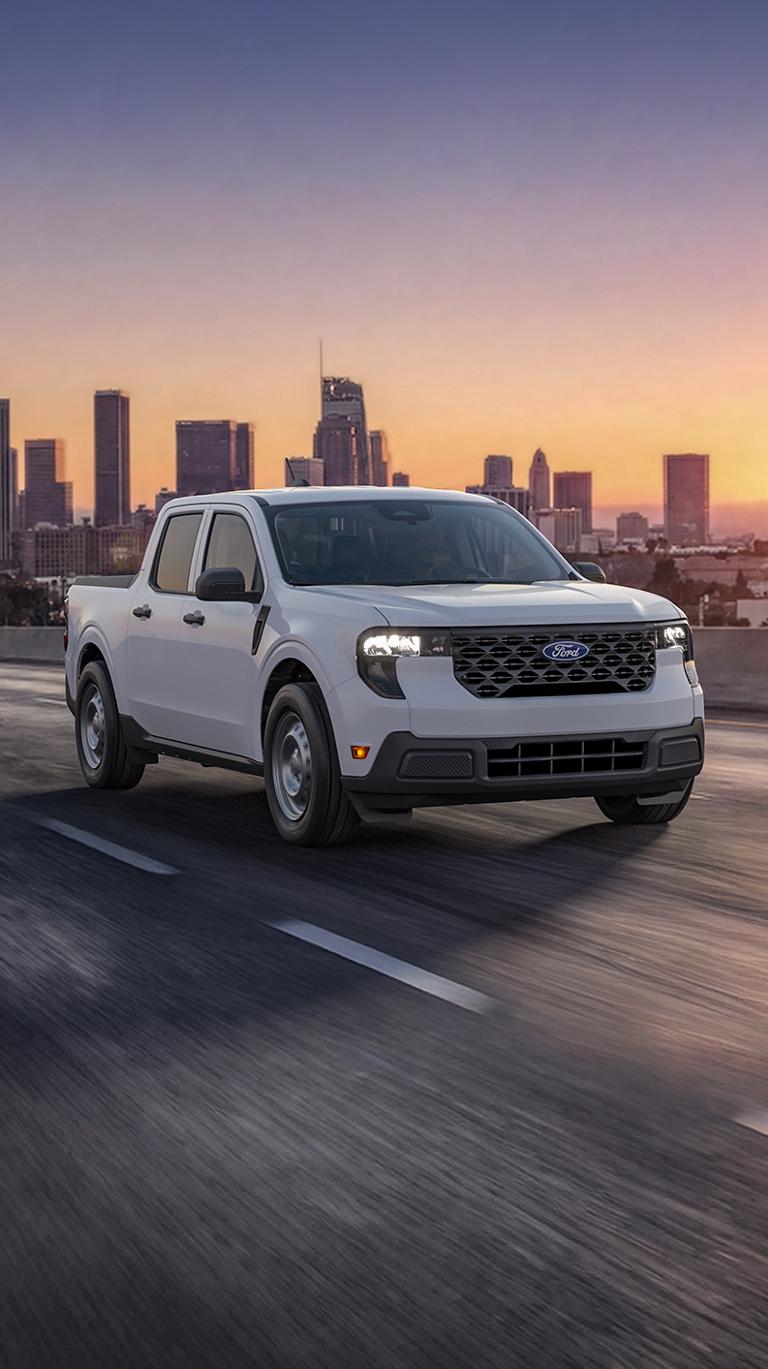 2026 Ford Maverick® driving through a city