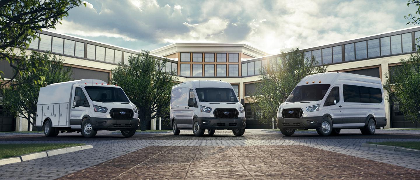 Three 2025 Ford Transit® Vans parked outside an office building