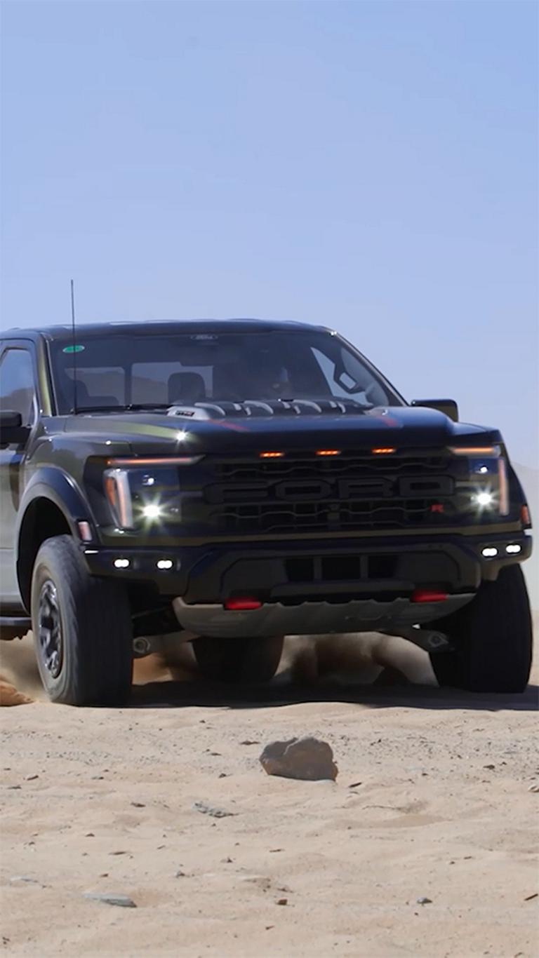 A 2026 Ford F-150® Raptor® tearing through the desert