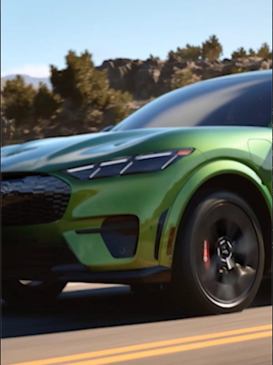 A 2026 Ford Mustang Mach-E® SUV being driven on a highway