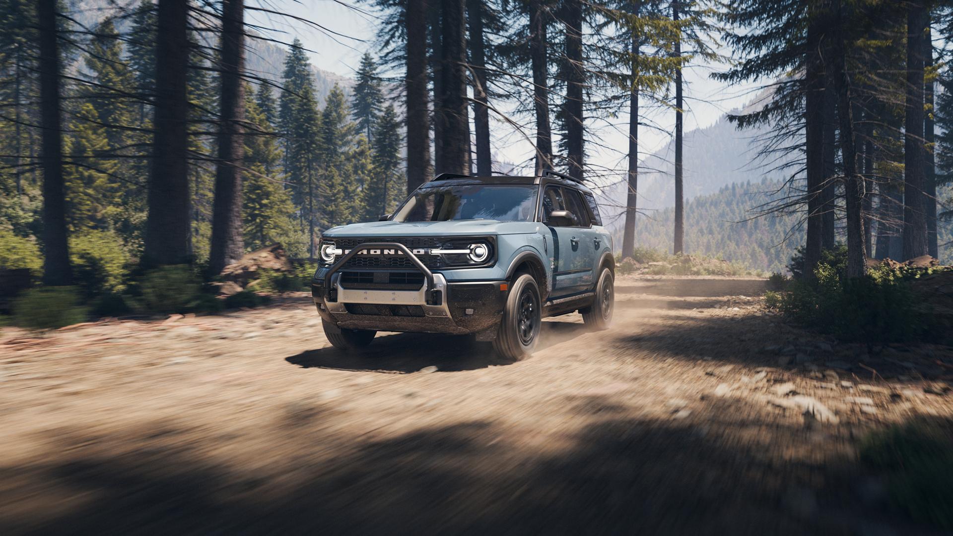 A 2026 Ford Bronco Sport® being driven on a dirt trail