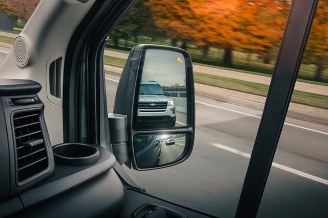 2025 Ford Transit® model passenger-side mirror showing the Blind Spot Assist