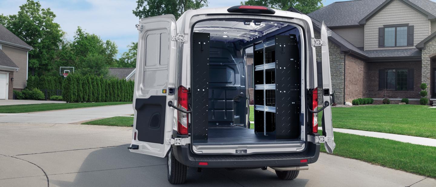 A 2025 Ford Transit® van with doors open showing all the cargo space