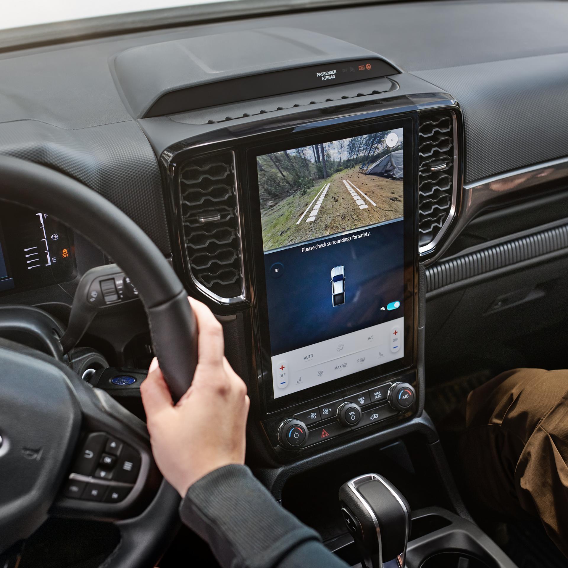 Interior view of both the cluster display and center display inside the 2026 Ford Ranger® truck