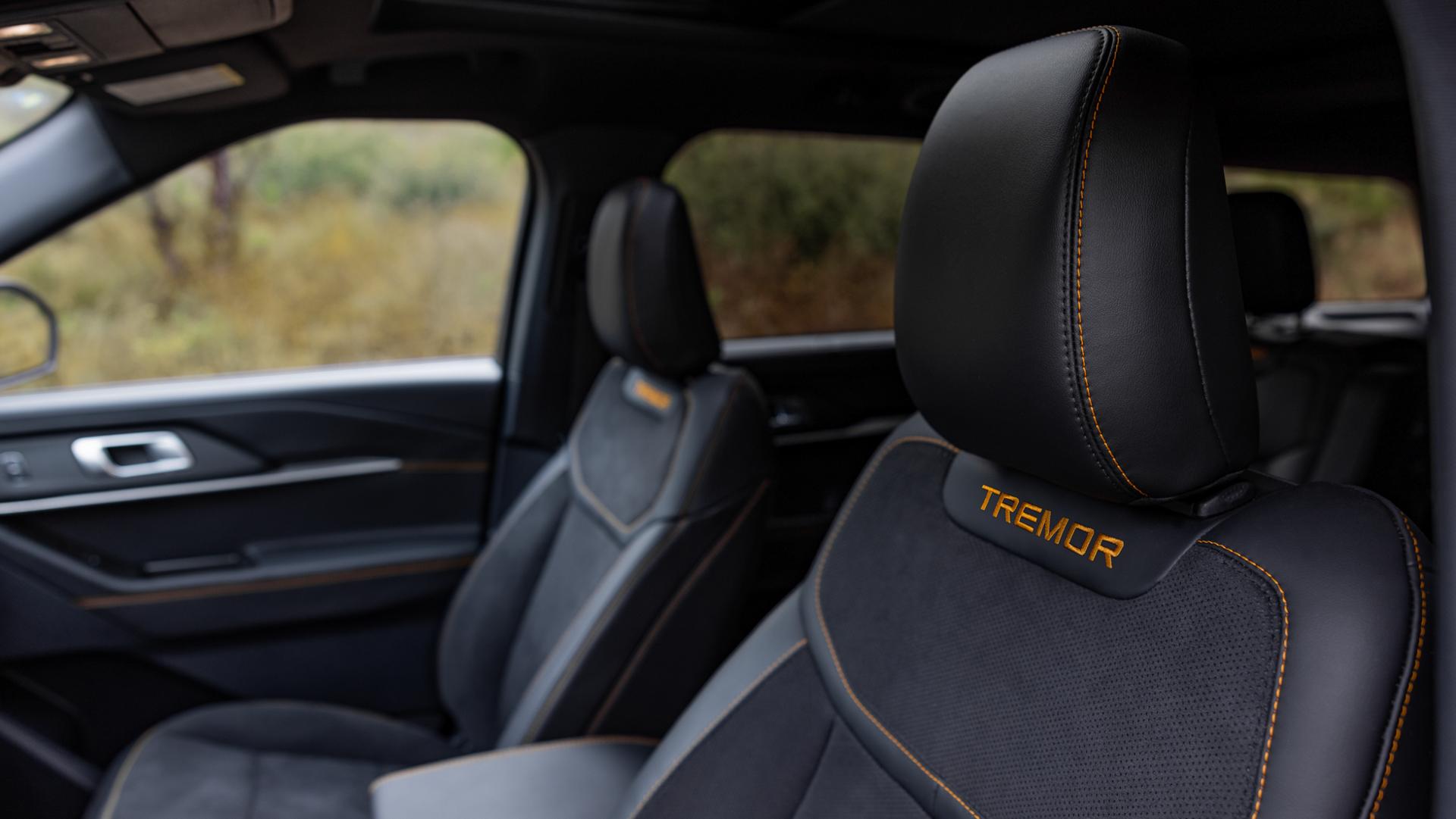 The seats of a 2026 Ford Explorer® Tremor® SUV, showing the model name stitched into the headrests