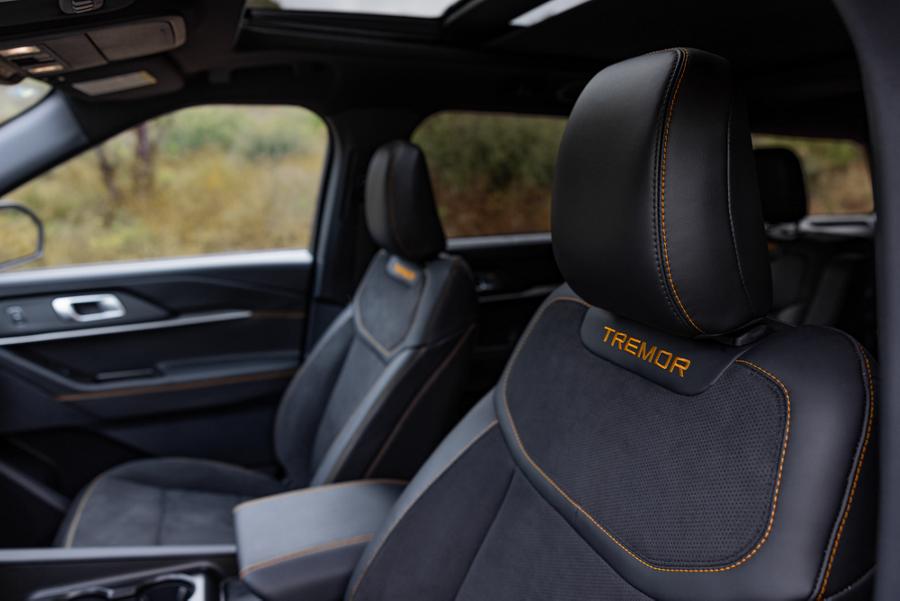 The seats of a 2026 Ford Explorer® Tremor® SUV, showing the model name stitched into the headrests