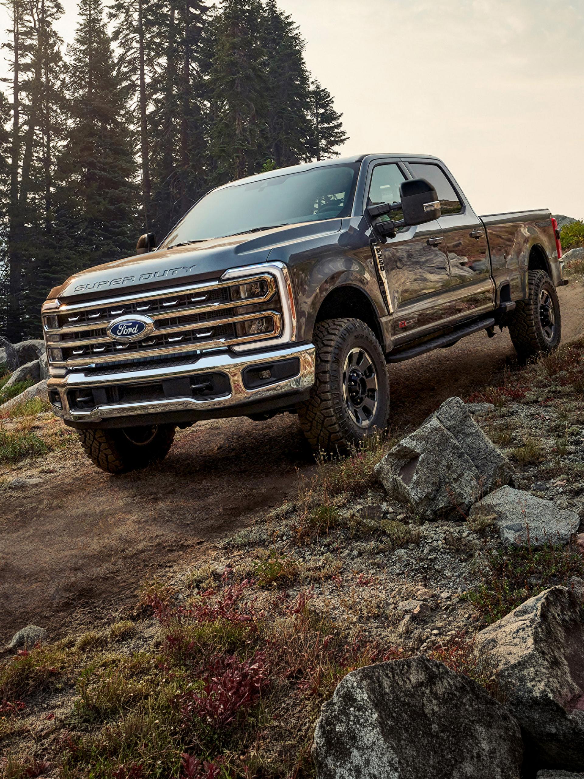2027 Ford Super Duty® F-250® pickup with the available Tremor® Off-Road Package parked on a rocky mountain side