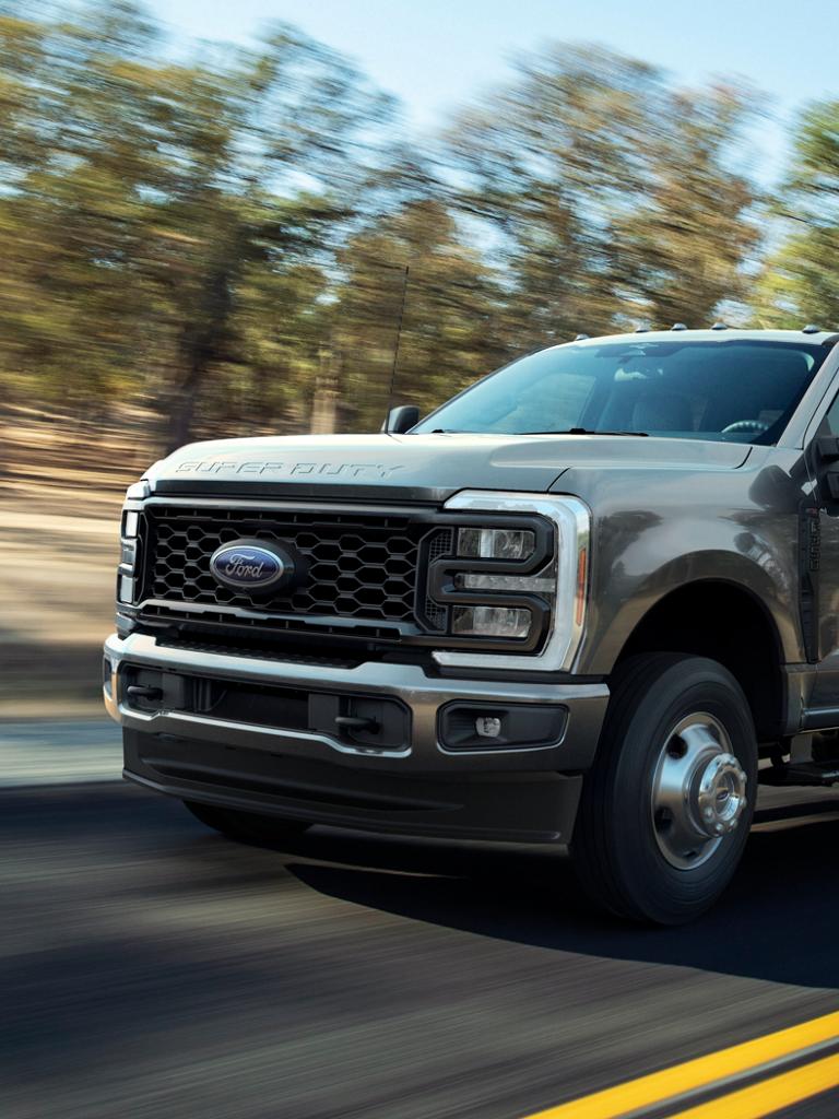 2026 Ford Super Duty® F-350® XL with the STX® Appearance Package being driven on a paved road