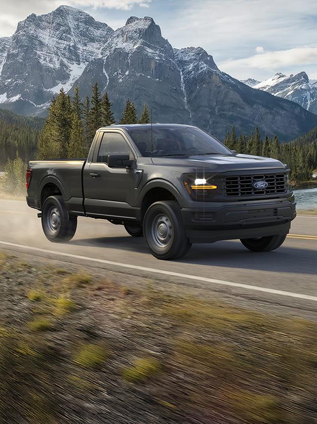 A 2026 Ford F-150® being driven on a dirt road