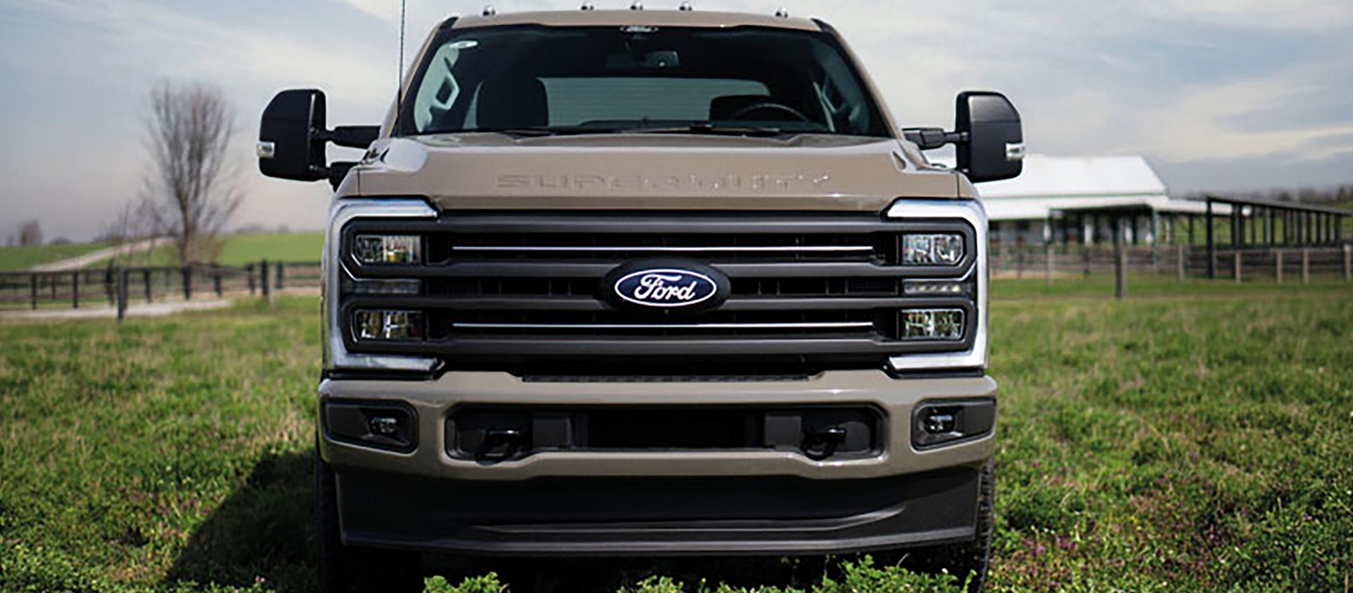 2027 Ford Super Duty® F-250® XLT model with the Super Duty Carhartt® Package parked in a grassy field