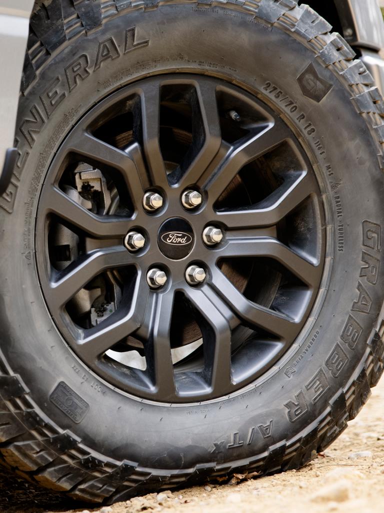 Close-up of the 33-inch wheel and all-terrain tire on a 2026 Ford F-150® Tremor® truck