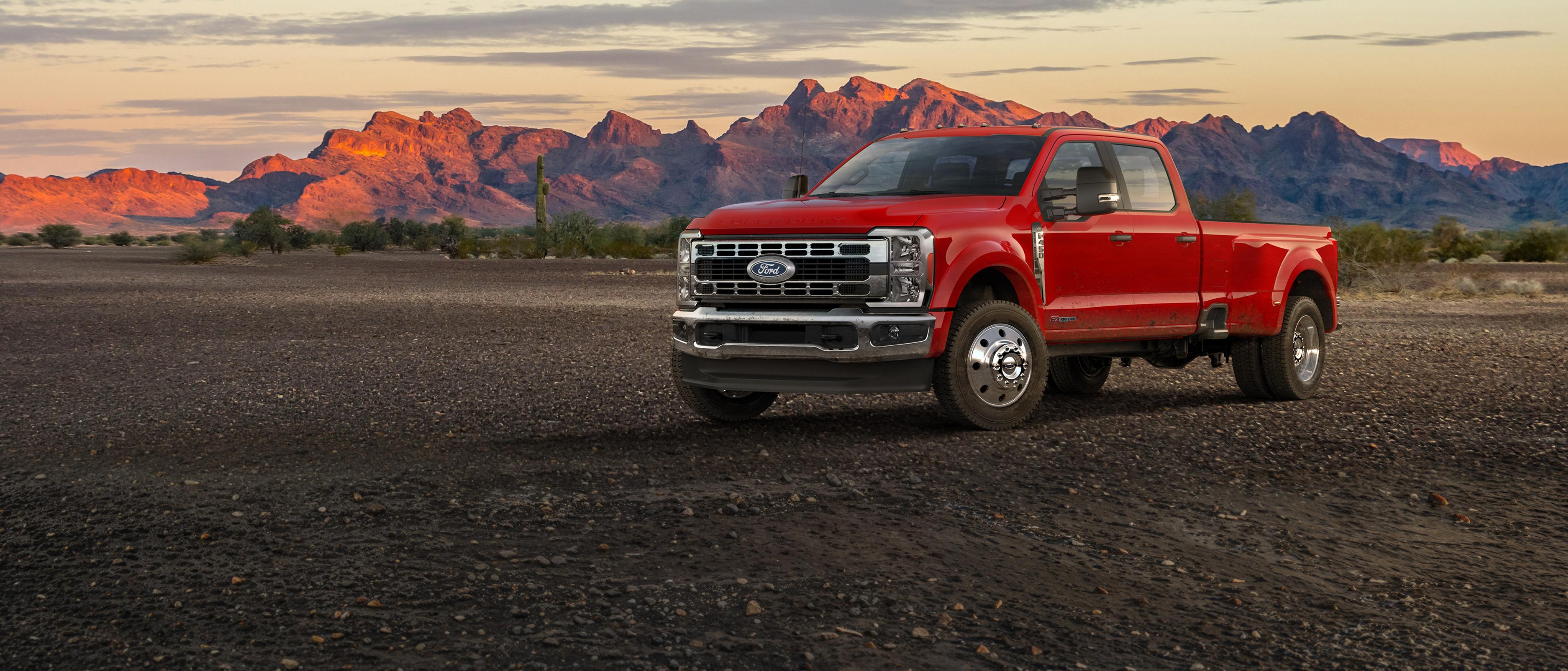 2027 Ford Super Duty® F-450® XLT truck parked on a dirt road in the mountains