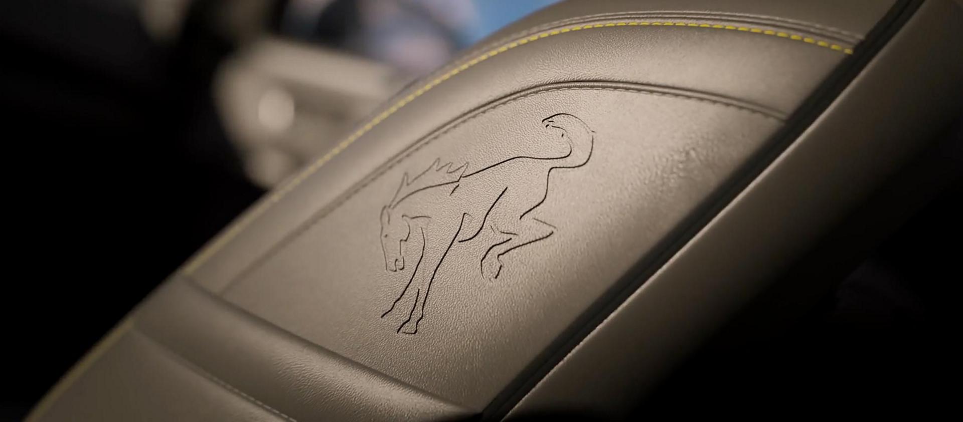 Interior of the vehicle highlighting the seating and the center console screen