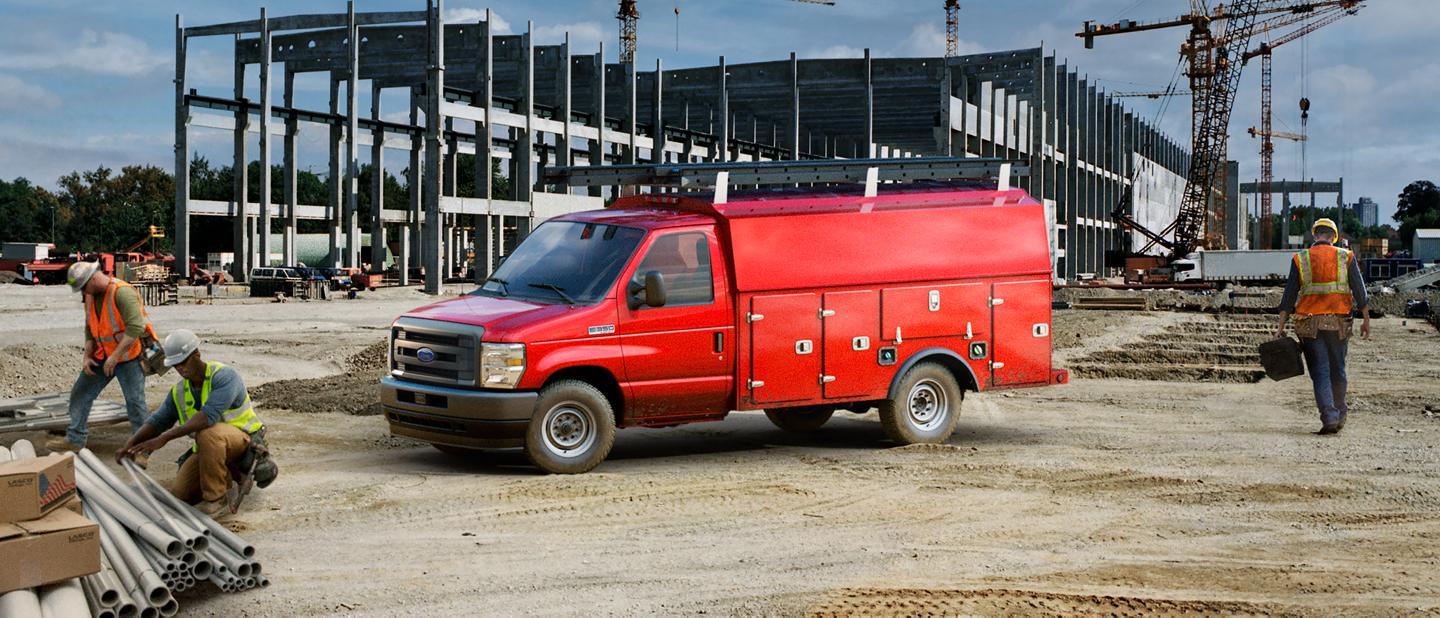 2026 Ford E-Series Cutaway with drive upfit parked at construction site