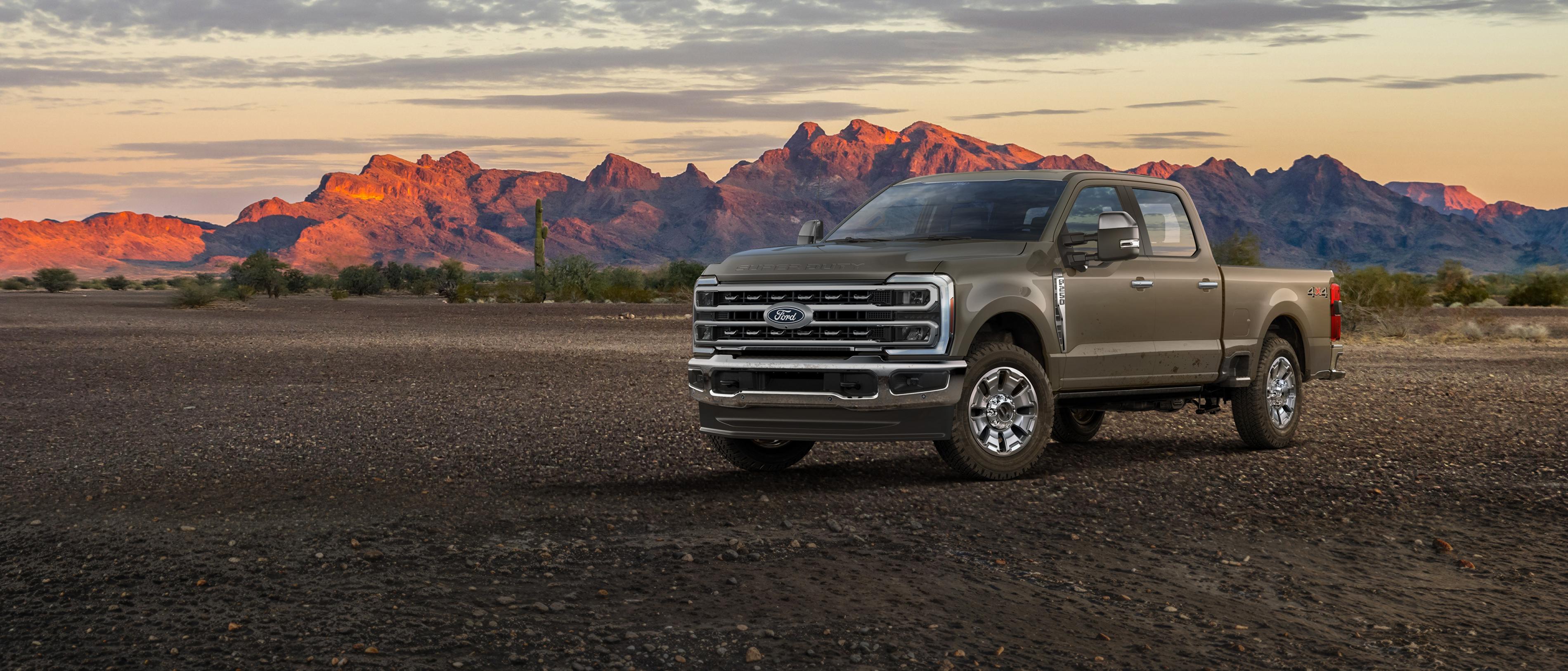 2027 Ford Super Duty® F-250® King Ranch® truck parked on a dirt road in the mountains