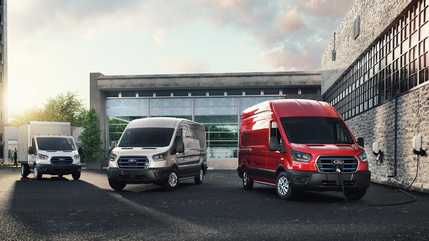Three 2025 Ford E-Transit™ vehicles parked in a business lot