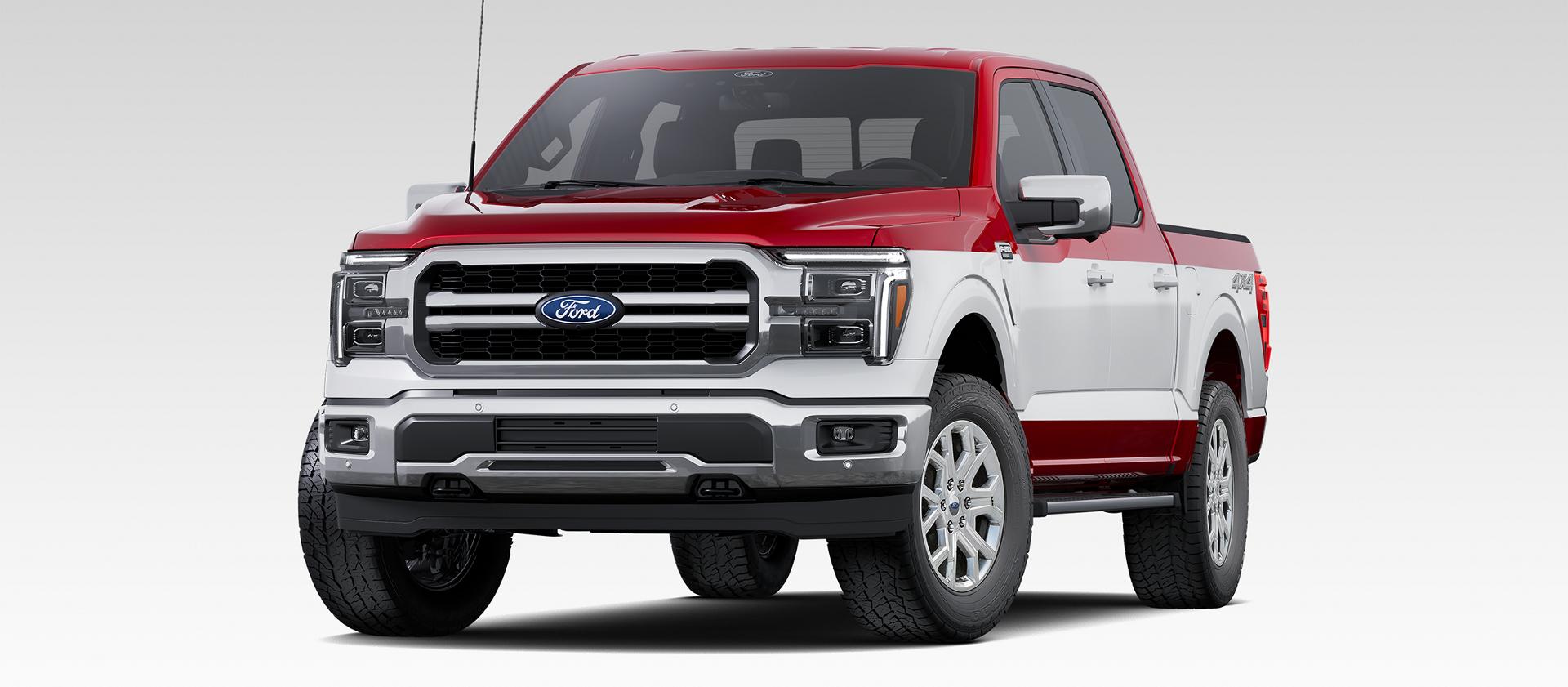 Front driver-side view of a 2027 Ford F-150®Two-Tone Package with Oxford White and red exterior accents
