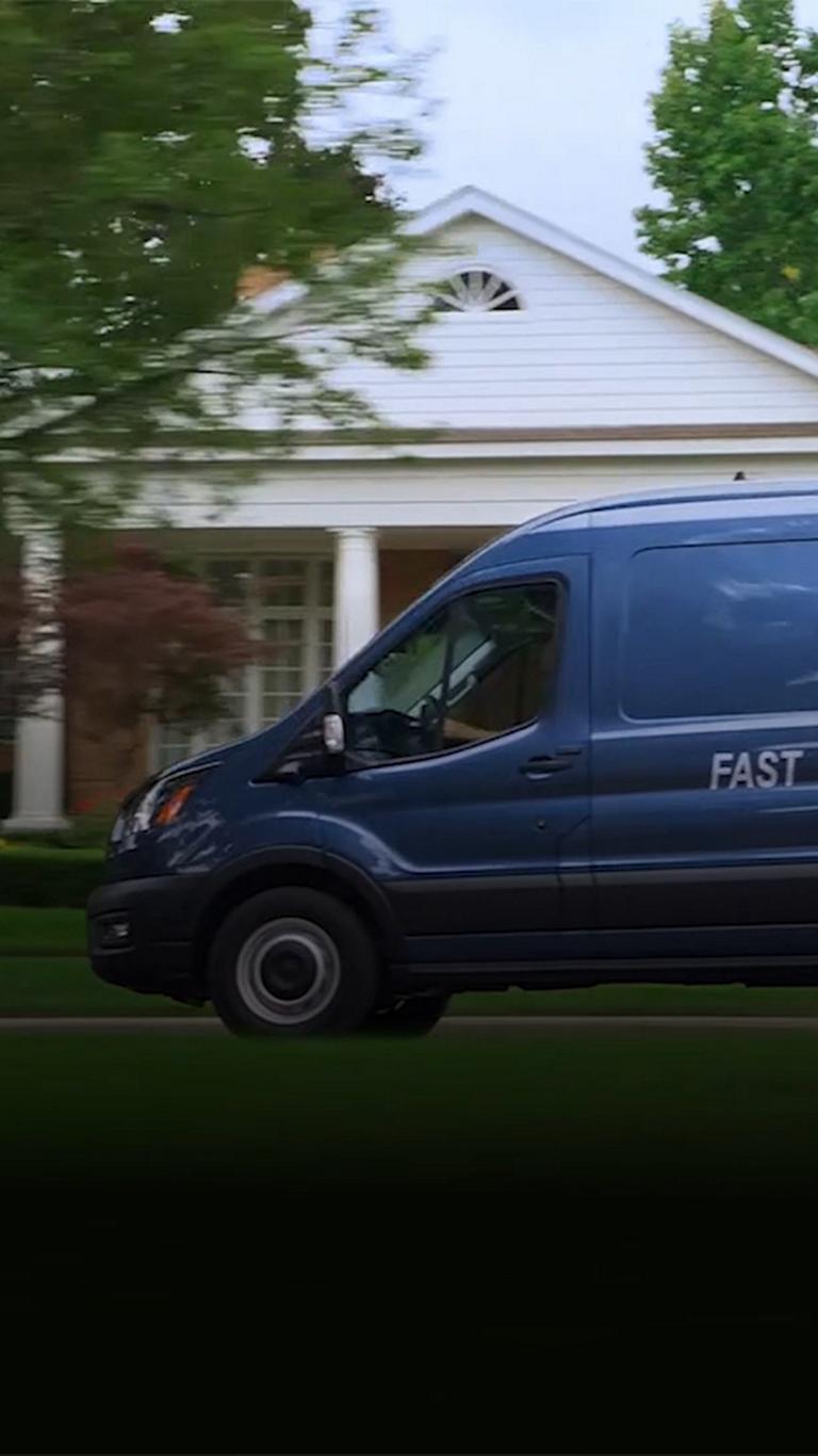 A 2026 Ford Transit® van making deliveries