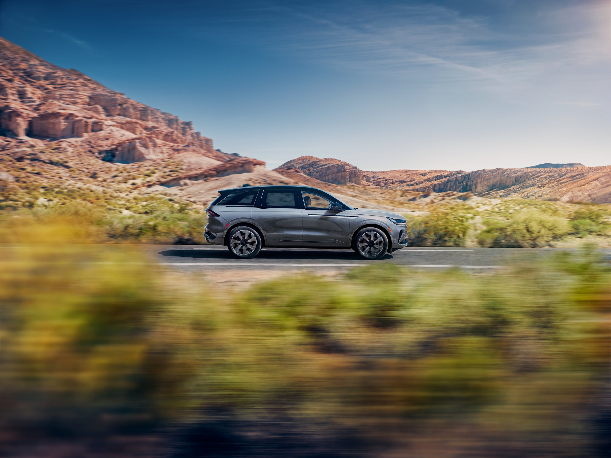 A 2025 Lincoln Nautilus Reserve model is being driven through a desert setting