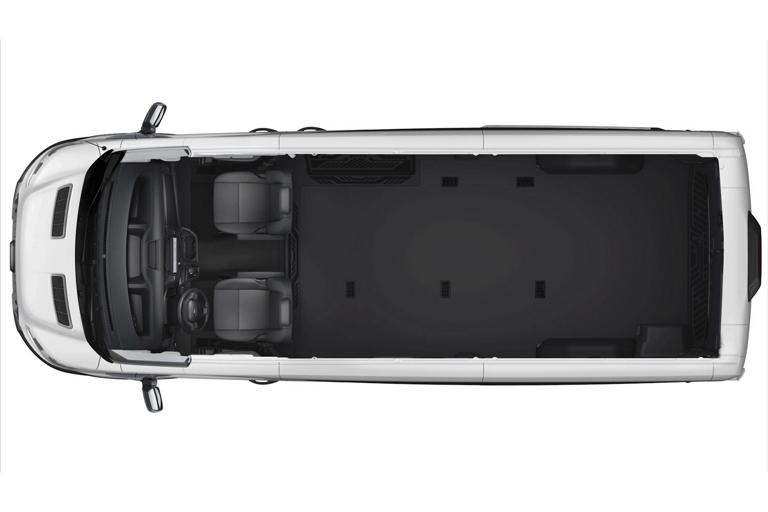 A top-down, overhead view of a 2026 Ford Transit® van with different seating arrangements