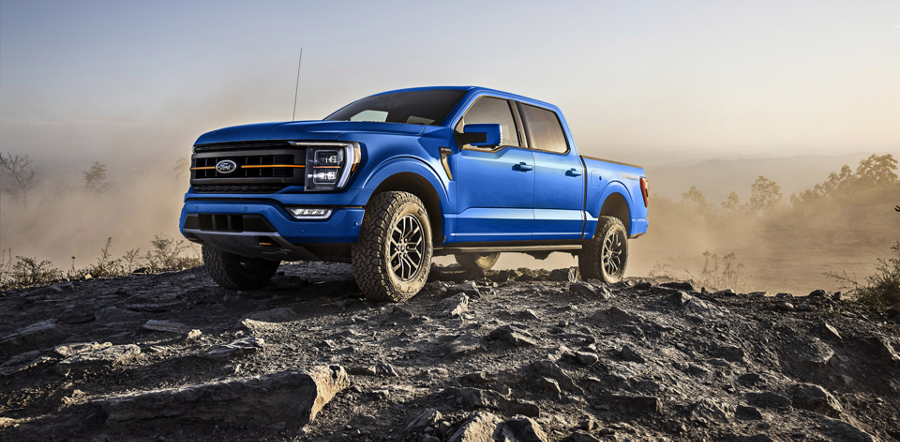 2022 Ford F-150® Tremor® in Velocity Blue parked on a rocky trail