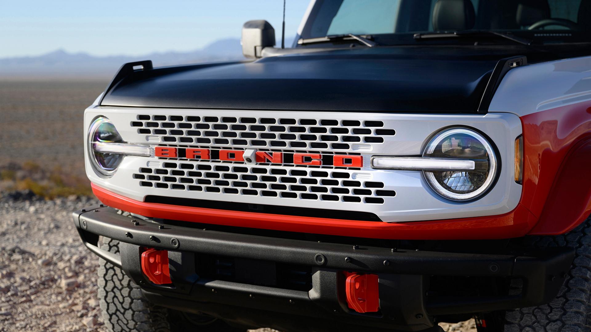 A front view of a 2026 Ford Bronco® Stroppe Edition SUV parked on a rocky landscape