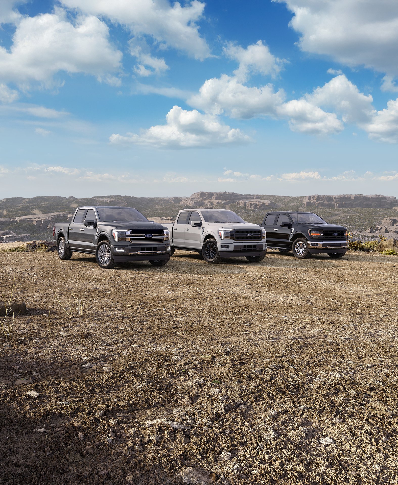 Three 2026 Ford F-150 Trucks parked next to each other on a dusty road