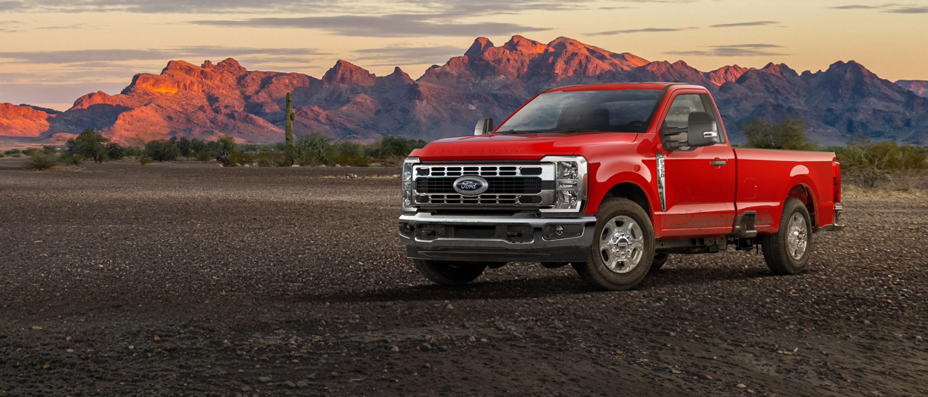 2026 Ford Super Duty® F-350® XLT truck parked on a dirt road in the mountains