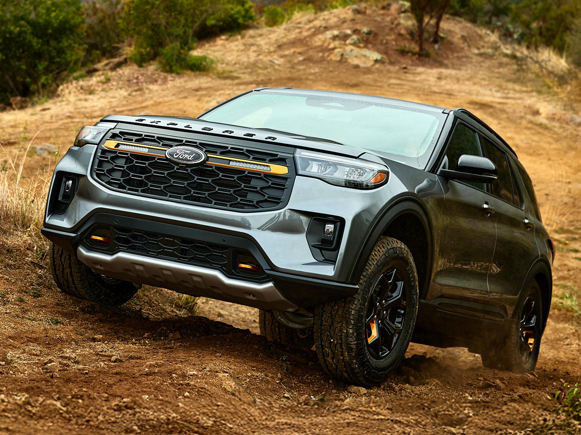 A 2026 Ford Explorer® Tremor® SUV being driven on a rocky landscape