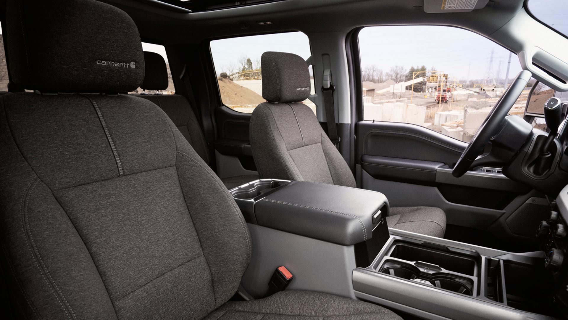 Front seats view inside the 2027 Ford Super Duty® F-350® XLT with the Super Duty Carhartt® Package
