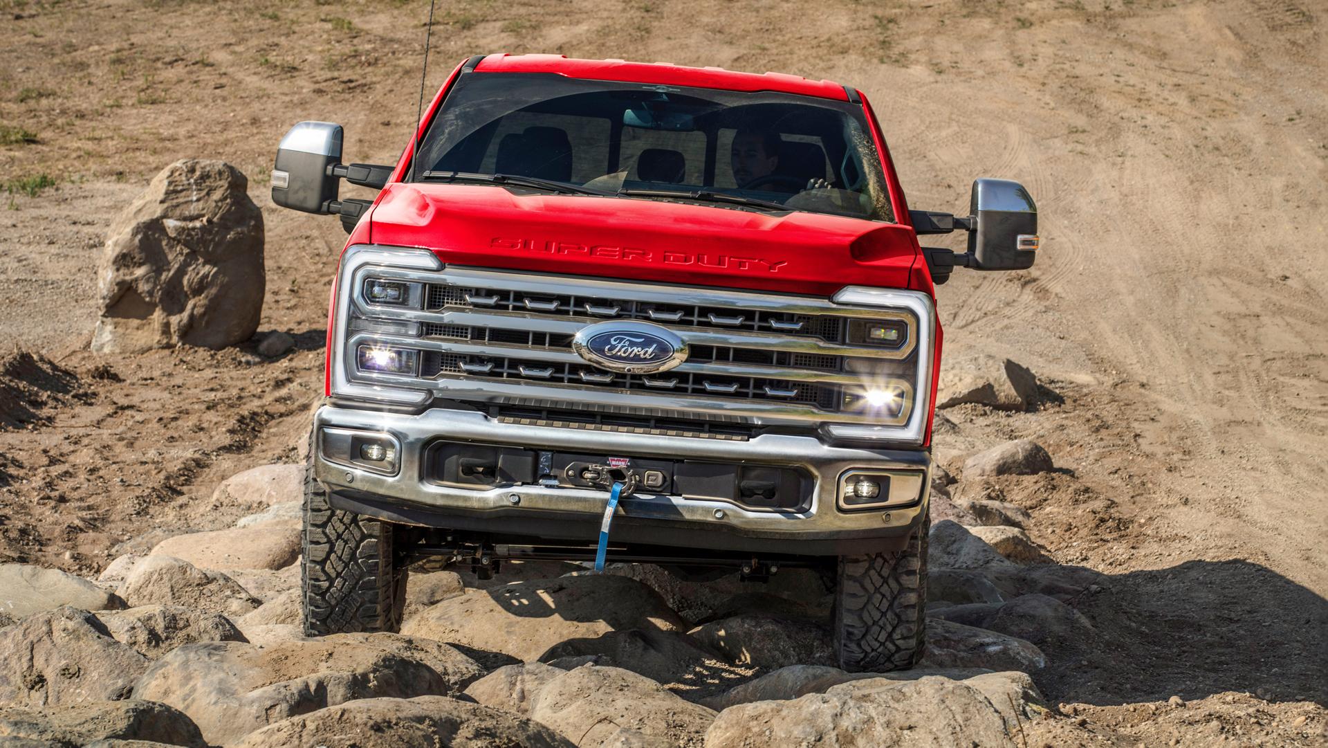 2026 Ford Super Duty® F-250® pickup with the Tremor® Off-Road Package driving on rocky terrain