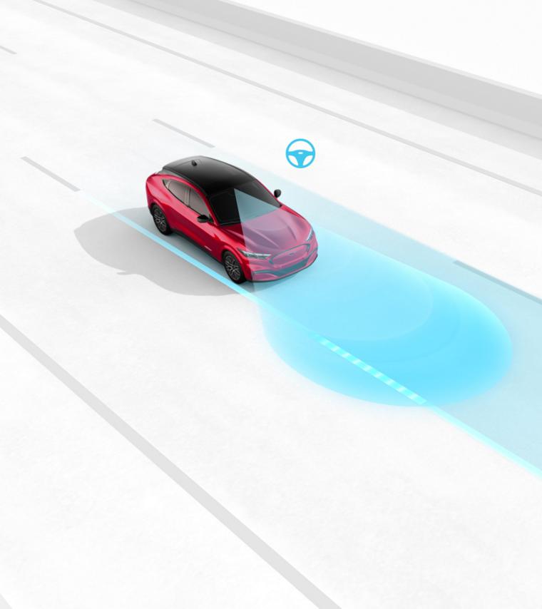 Over-head shot of a 2025 Ford Mustang Mach-E driving down road using lane-assist